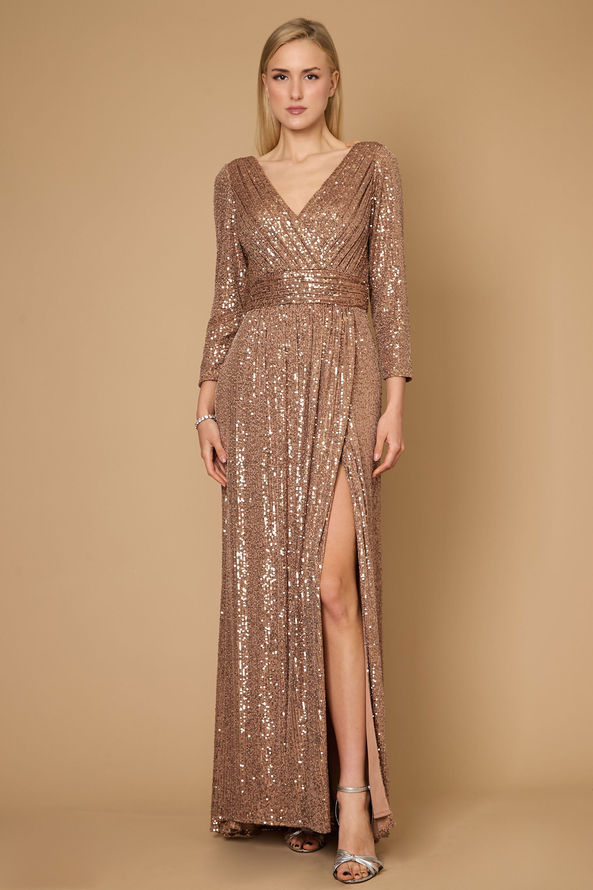 A stunning long sleeve formal dress adorned with intricate hand-beaded sequins in a rich bronze hue, perfect for elegant evening events.