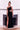 A stunning black prom dress featuring elegant side cutouts, designed to accentuate the figure with a sleek silhouette and sophisticated style.