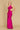 A stunning magenta prom dress featuring elegant side cutouts, designed for a glamorous and sophisticated look.