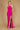 A stunning magenta long fitted prom dress featuring an elegant open back design, showcasing a sleek silhouette that flows gracefully to the floor.