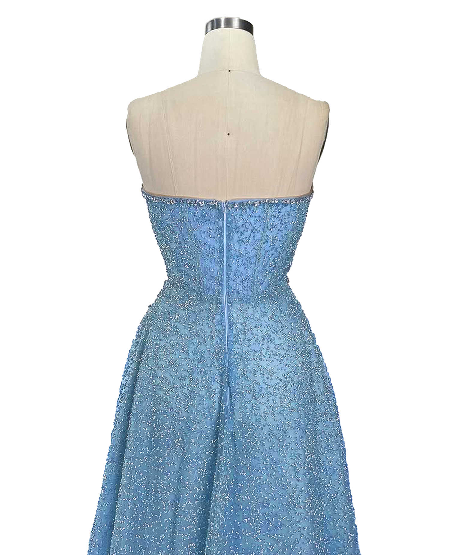 A stunning long strapless formal couture dress adorned with intricate hand-beaded details, showcasing elegance and sophistication.